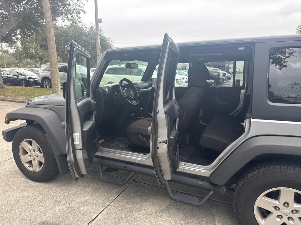 Florida Fine Cars - Used JEEP WRANGLER UNLIMITED 2015 WEST PALM SPORT