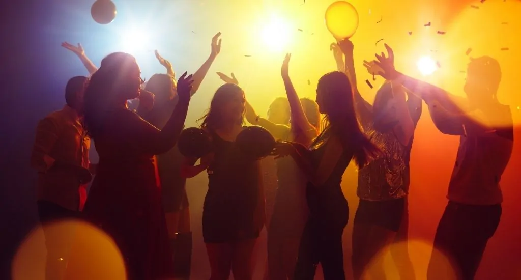 Entrepreneur celebrating with followers at live event