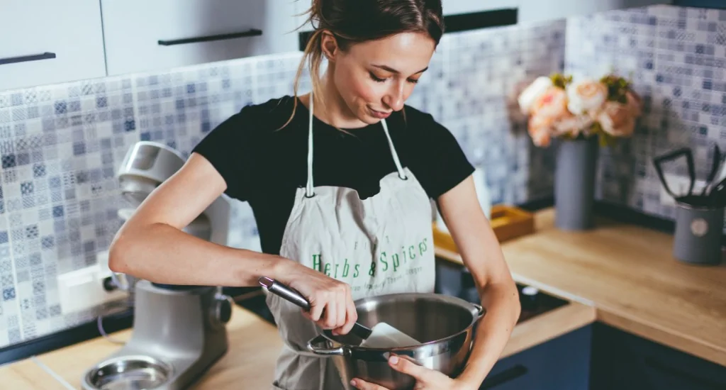 Entrepreneur cooking with meal kit