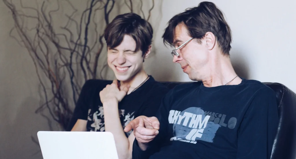 Father and son discussing funding for startup