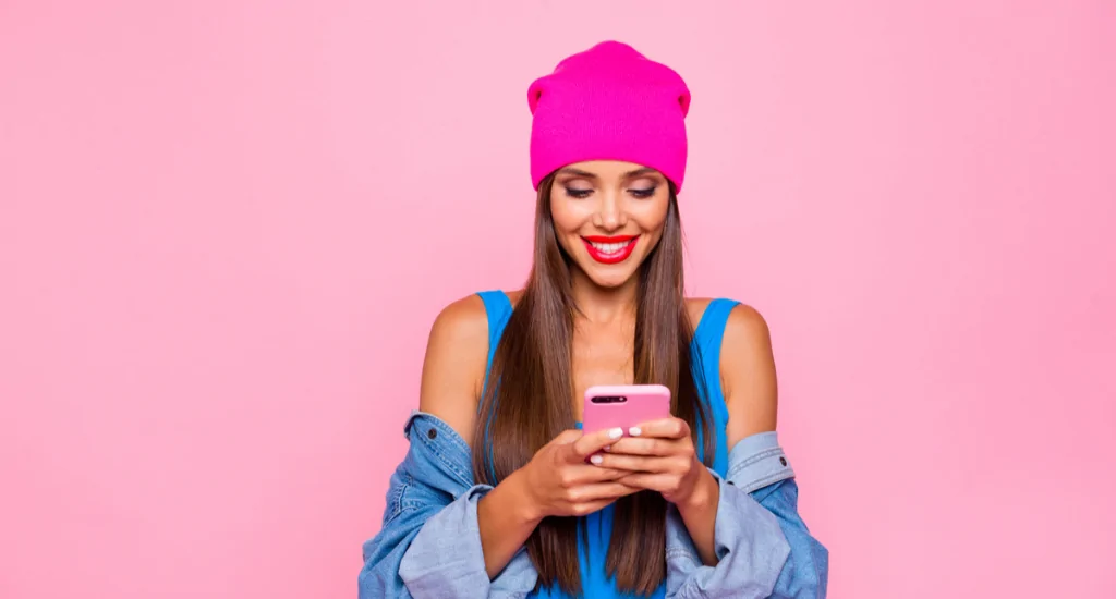 An entrepreneur looking down at a phone
