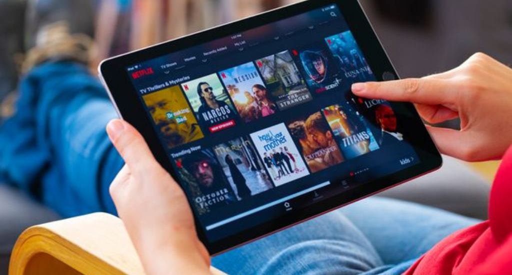 An entrepreneur browsing streaming services on iPad