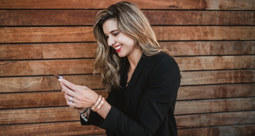 Entrepreneur planning marketing strategy on phone