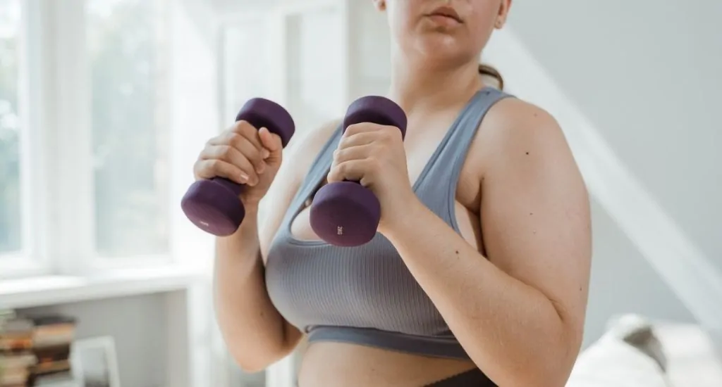 Entrepreneur working out at home gym