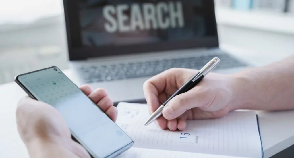 Entrepreneur taking notes on Google page experience update