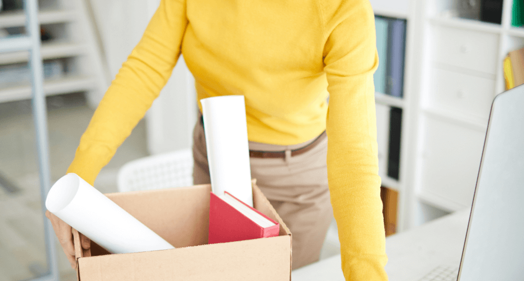 Woman packing after leaving job