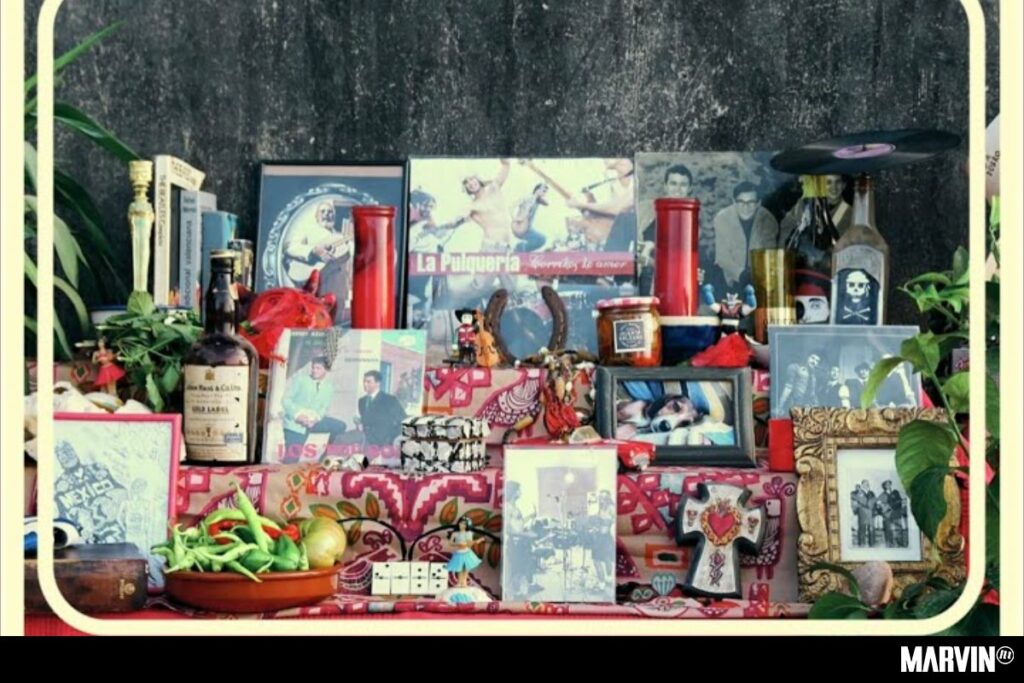Santero y los muchachos ayudan a montar el altar con “Día de muertos”