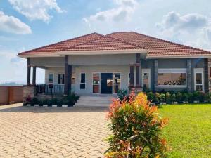 4 bedroom Bungalow Apartment for sale Bwebajja Entebbe road  Kampala Central