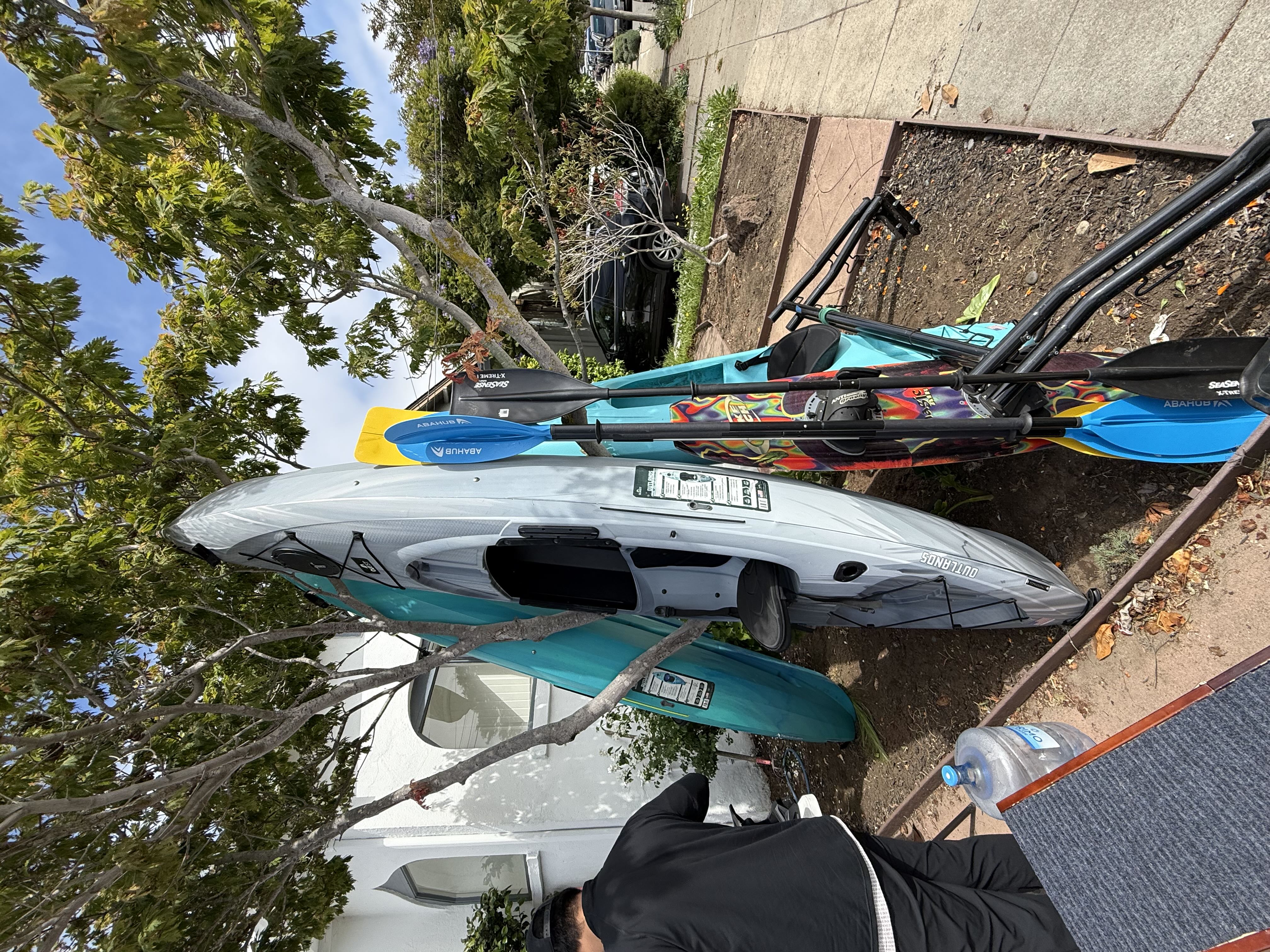 kayaks , camping stuff and golf stuff photo