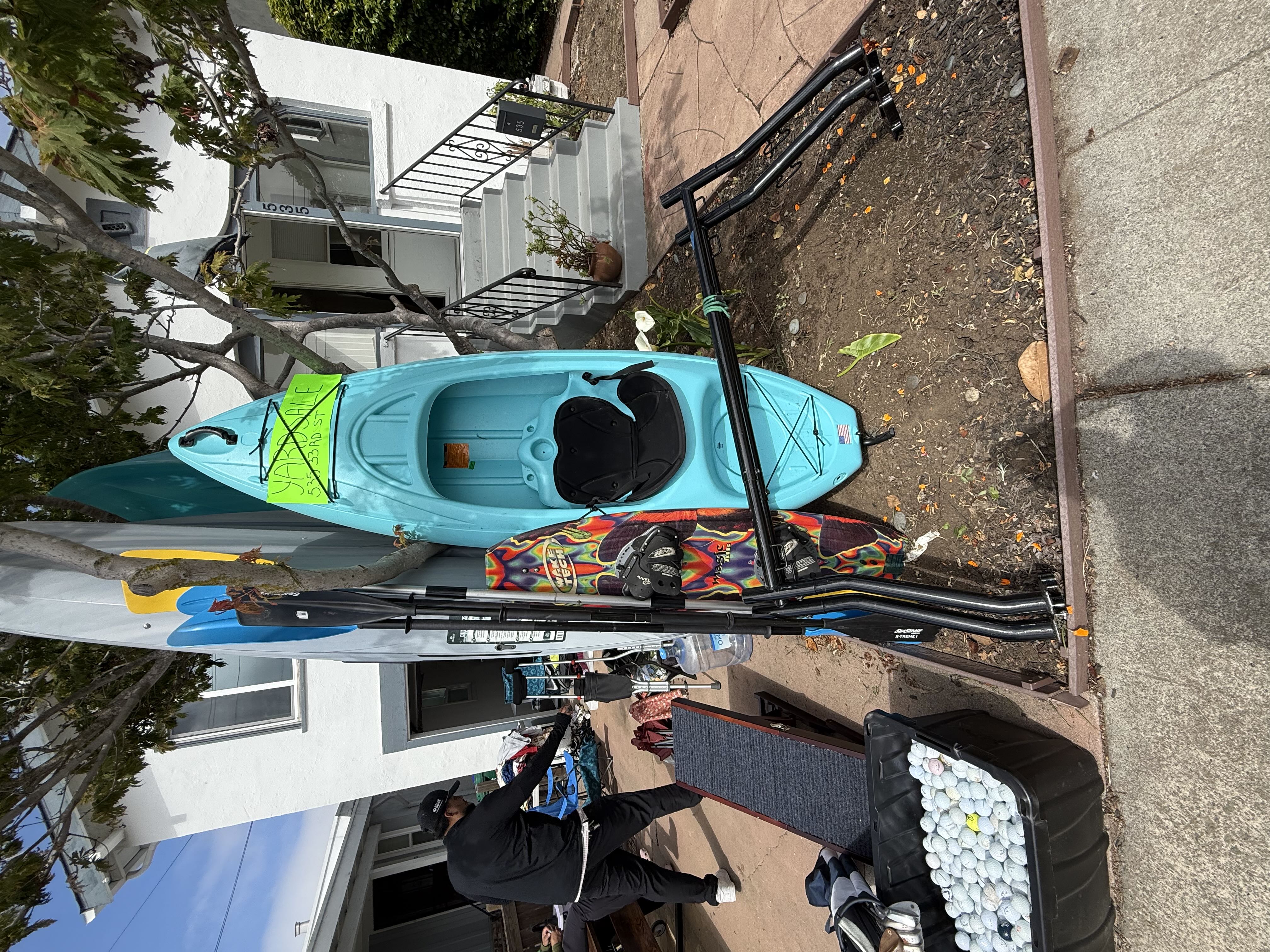 kayaks , camping stuff and golf stuff photo