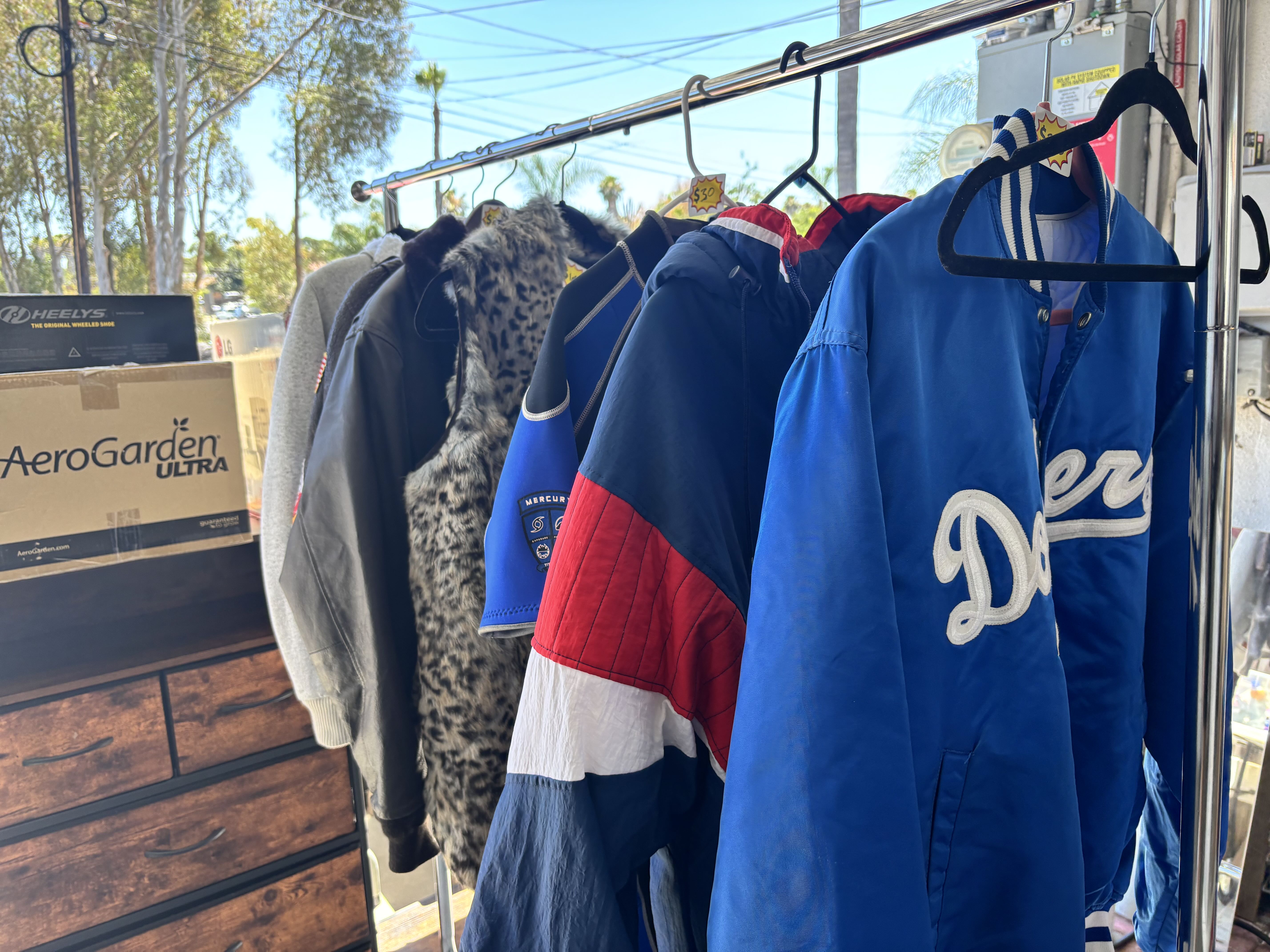 garage sale with video games, collectibles, new appliances, cookware photo