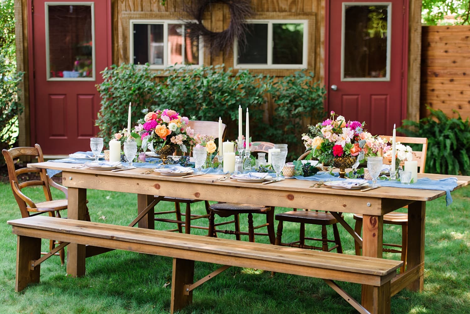 farmhouse tables with colorful floral centerpiece and table runner