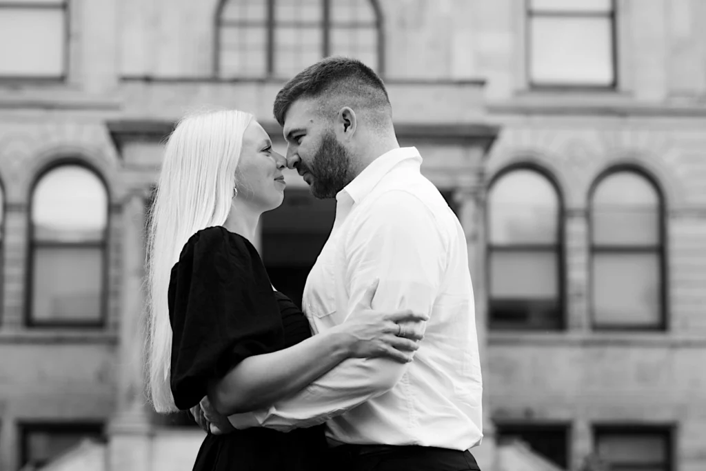 Black and white engagement photo at world food prize garden