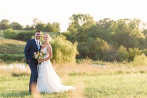 Sunset photos of bride and groom at Carper Winery & Vineyard in Iowa