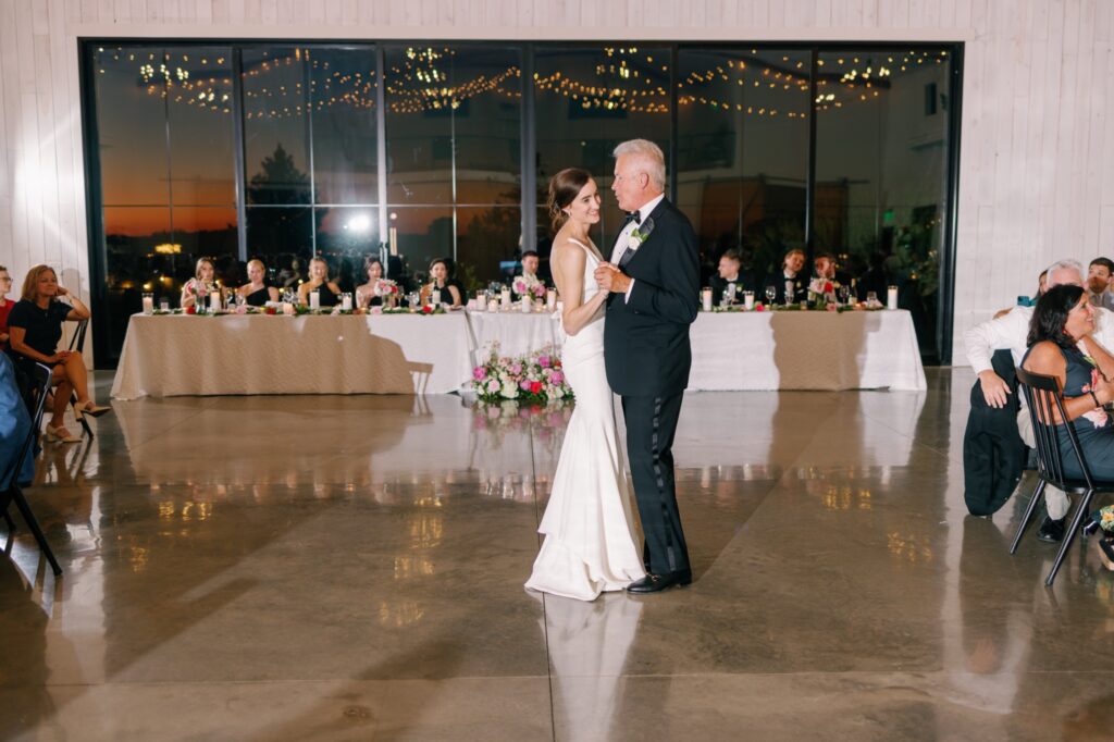 Bride shares first dance with her dad at little lights on the lane iowa city