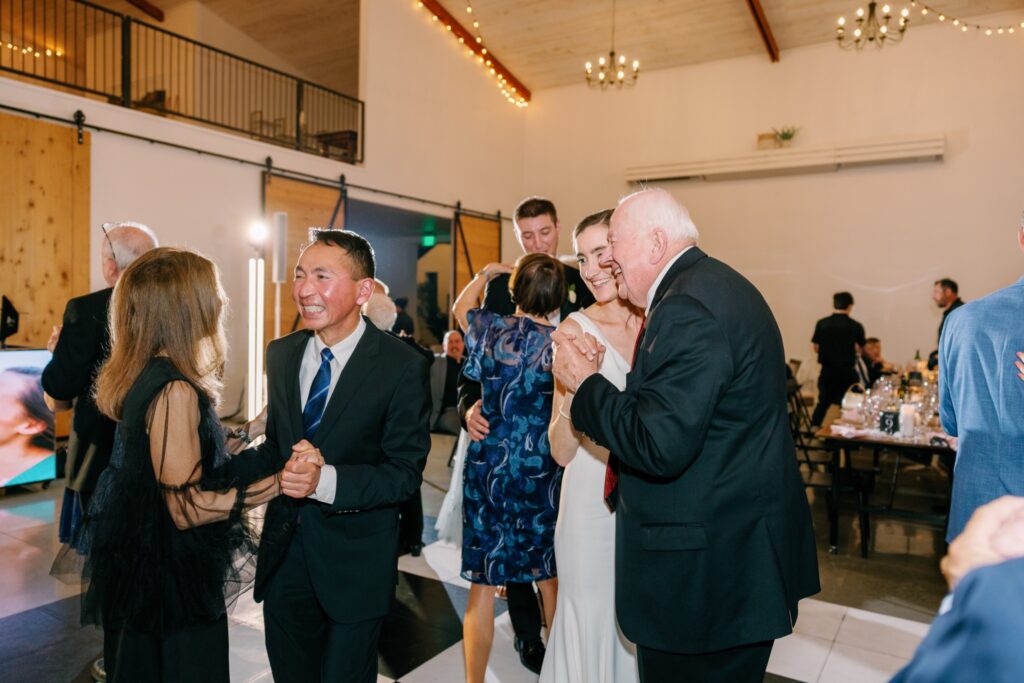 Reception dancing at little lights on the lane Iowa City with checkered dance floor