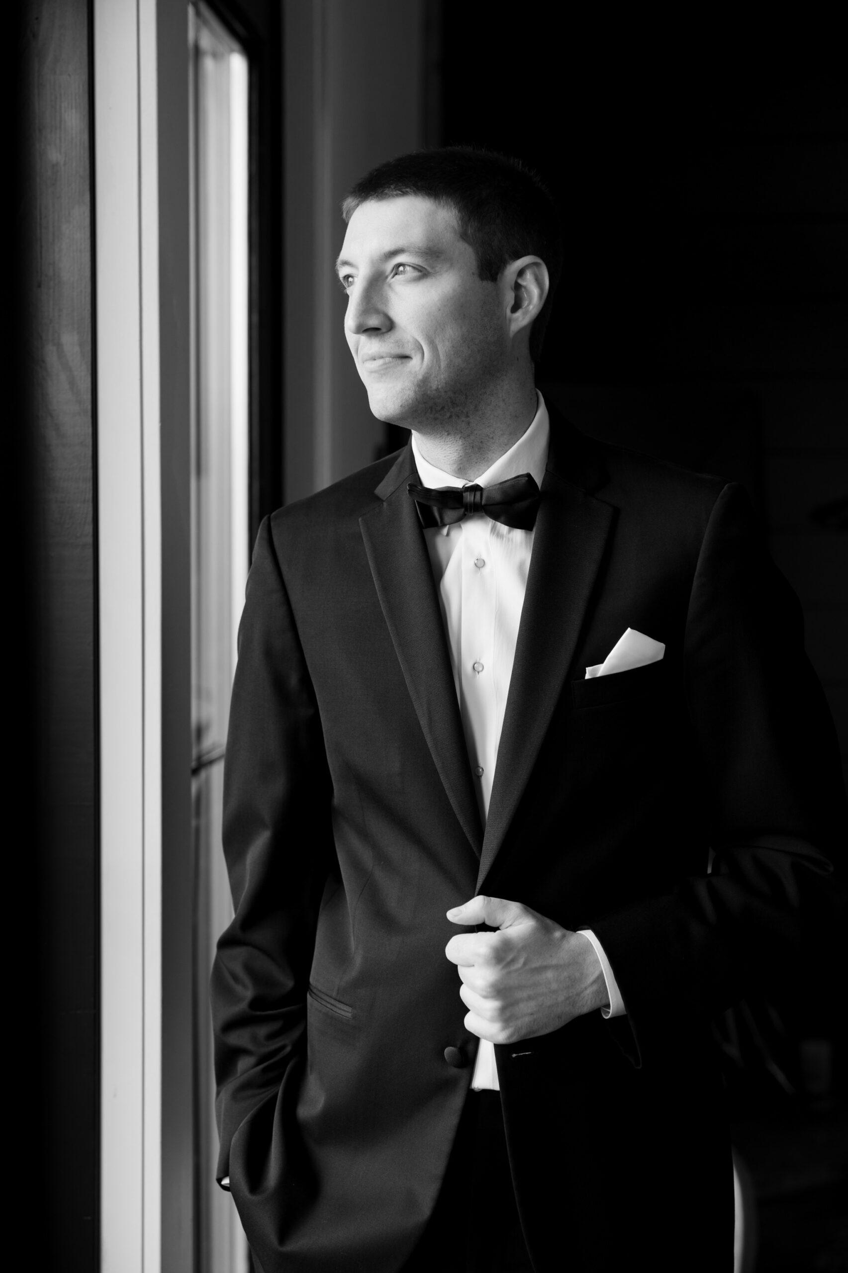 Groom getting ready at little lights on the lane Iowa City