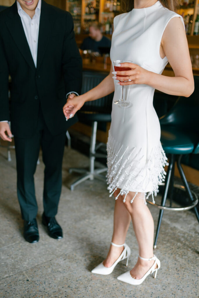 bartenders handshake engagement photos