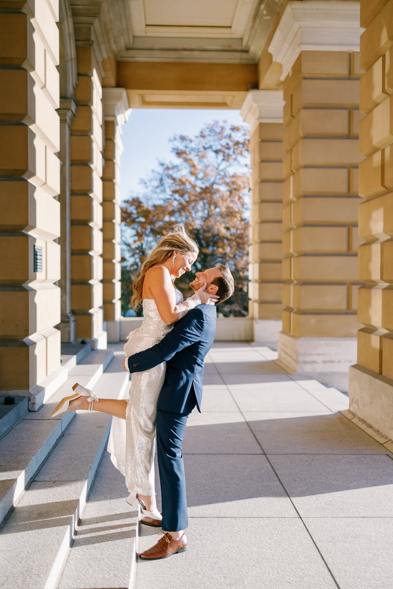 Editorial wedding photos in Des Moines with champagne and sparkly dress