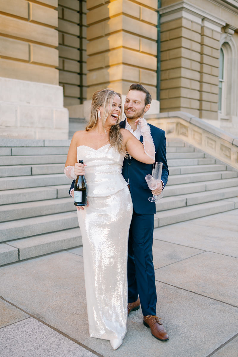 Des Moines capitol champagne engagement photo
