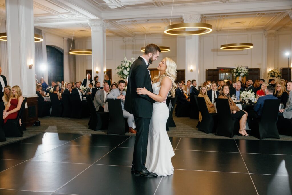 Bride and groom first dance at elegant wedding reception Des Moines Tea Room