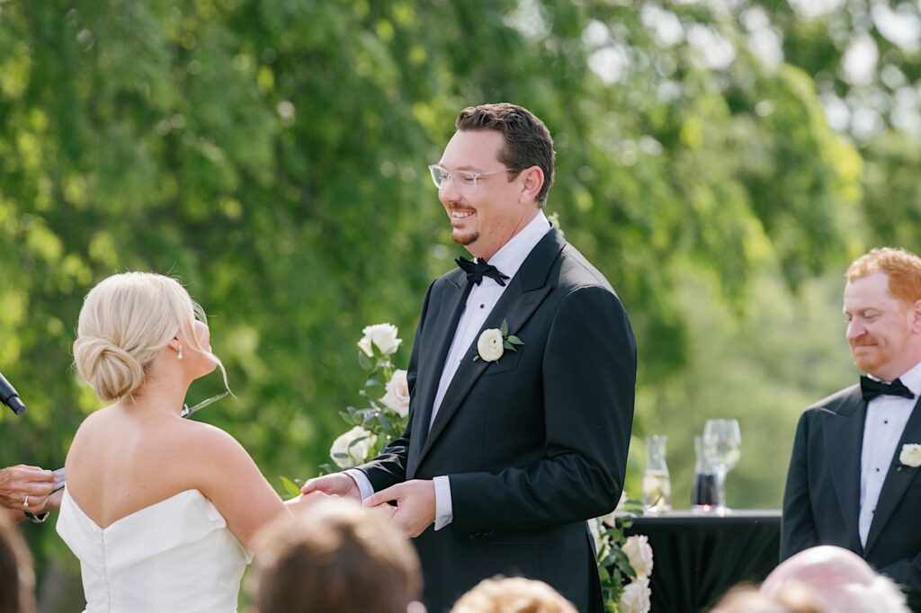 Outdoor wedding ceremony glen oaks country club croquet lawn