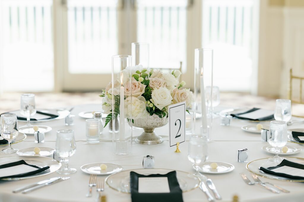 White wedding reception at Glen Oaks Country Club ballroom with silver and black details
