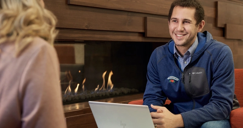  Man talking with laptop