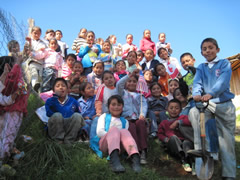 Children receiving symbolic monarch butterflifes in Mexico.