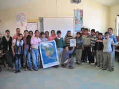 Children receiving symbolic monarch butterflifes in Mexico.