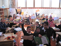 Children in Mexico receiving Symbolic Monarch Butterflies