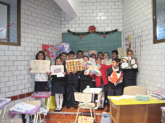 Children in Mexico receiving Symbolic Monarch Butterflies