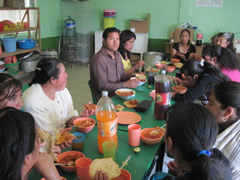 Children receiving symbolic monarch butterflies in Mexico.