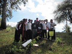Children receiving symbolic monarch butterflies in Mexico.