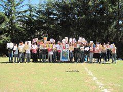 Children receiving symbolic monarch butterflifes in Mexico.