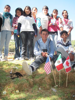 Children receiving symbolic monarch butterflifes in Mexico.