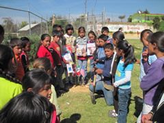 Children in Mexico receiving Symbolic Monarch Butterflies