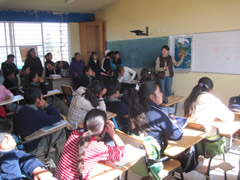Children receiving symbolic monarch butterflifes in Mexico.