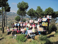 Children receiving symbolic monarch butterflifes in Mexico.