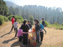 Children receiving symbolic monarch butterflifes in Mexico.
