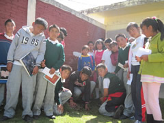 Children in Mexico receiving Symbolic Monarch Butterflies