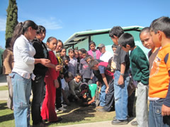 Children in Mexico receiving Symbolic Monarch Butterflies