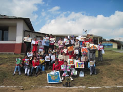 Children receiving symbolic monarch butterflifes in Mexico.