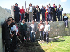 Children receiving symbolic monarch butterflies in Mexico.