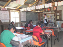 Children receiving symbolic monarch butterflies in Mexico.