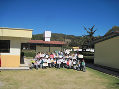 Children in Mexico receiving Symbolic Monarch Butterflies
