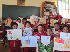 Children in Mexico receiving Symbolic Monarch Butterflies