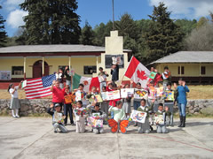 Children receiving Symbolic Monarch Butterflies in Mexico