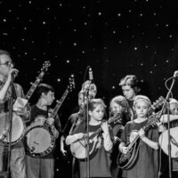 Ira Gitlin introduces the Kids Academy band at Joe Val (2/19/17) - photo © Tara Linhardt