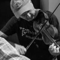 Pete Martin jammin in the hallways at Wintergrass 2017 - photo © Tara Linhardt